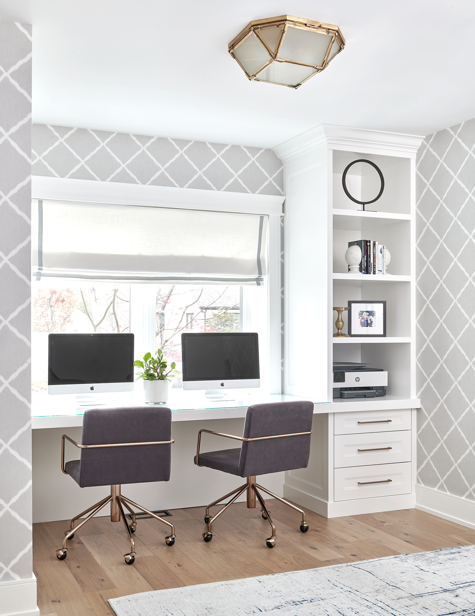 beautiful toronto home office designed by interior designer staci edwards - grey and white wallpaper, custom built in desk in front of window, with two computers and desk chairs