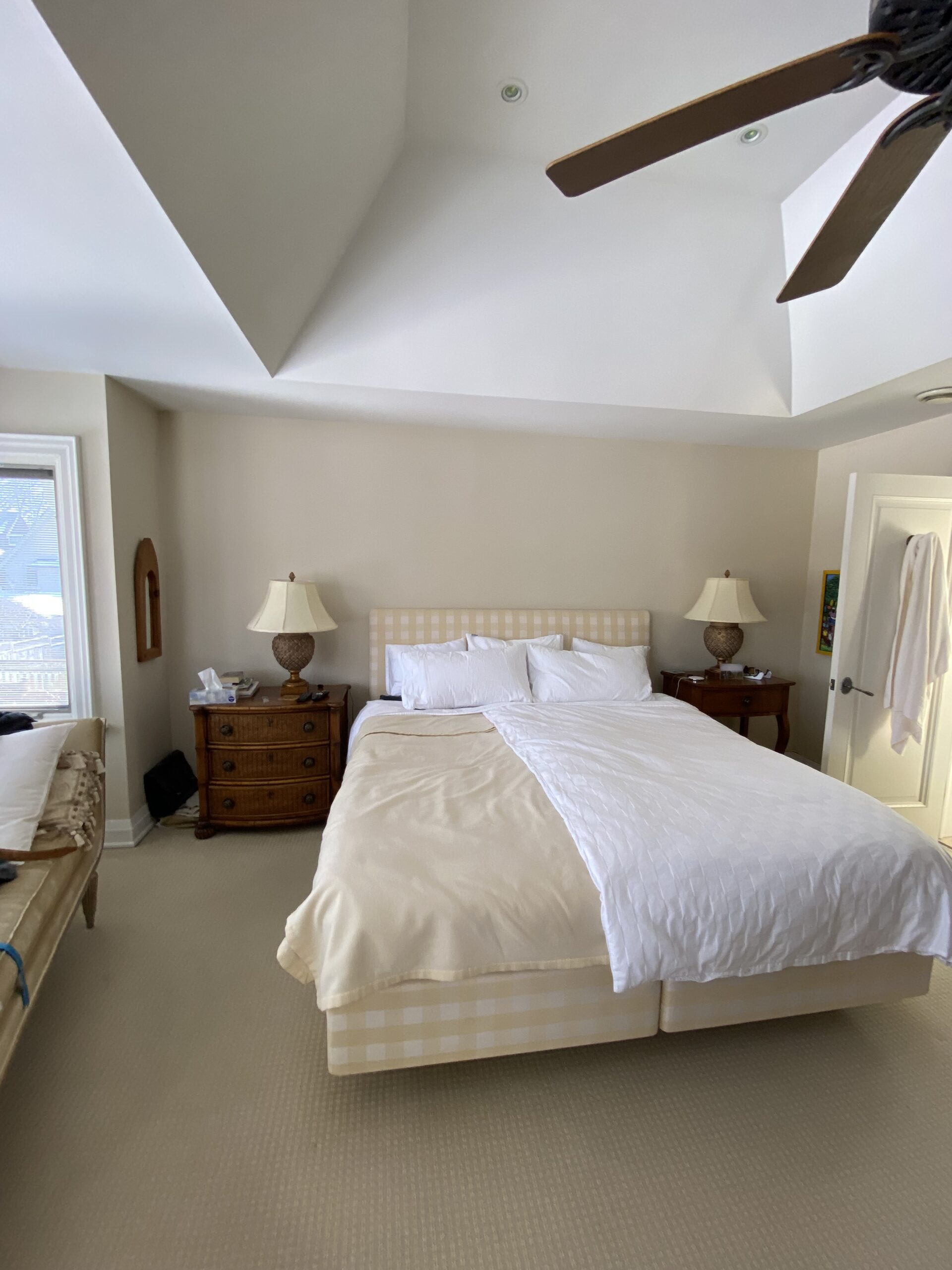Principal bedroom in Toronto home before renovation, plain and dated