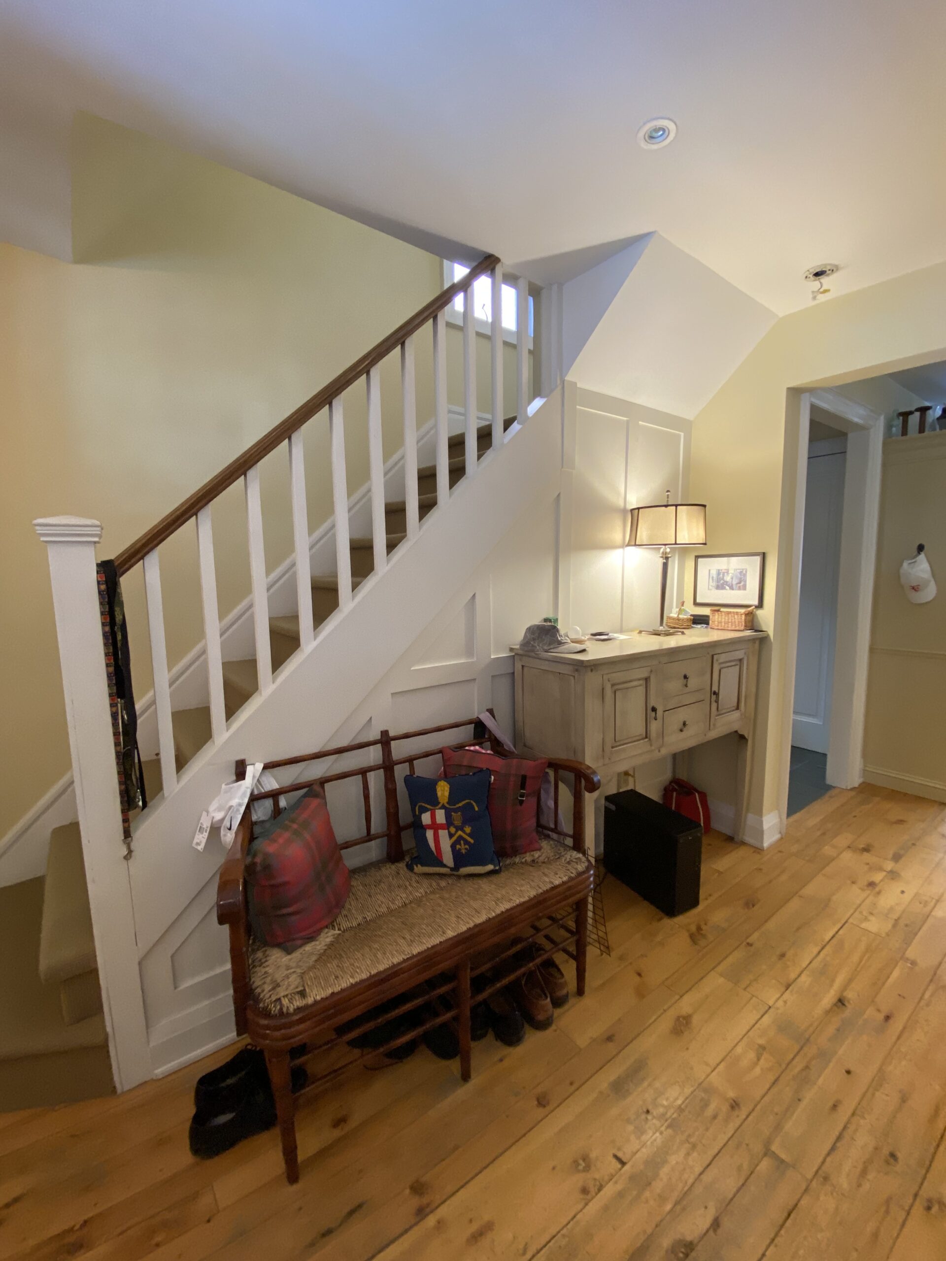 Foyer of Rosedale Toronto home before renovation, dark and dated entryway