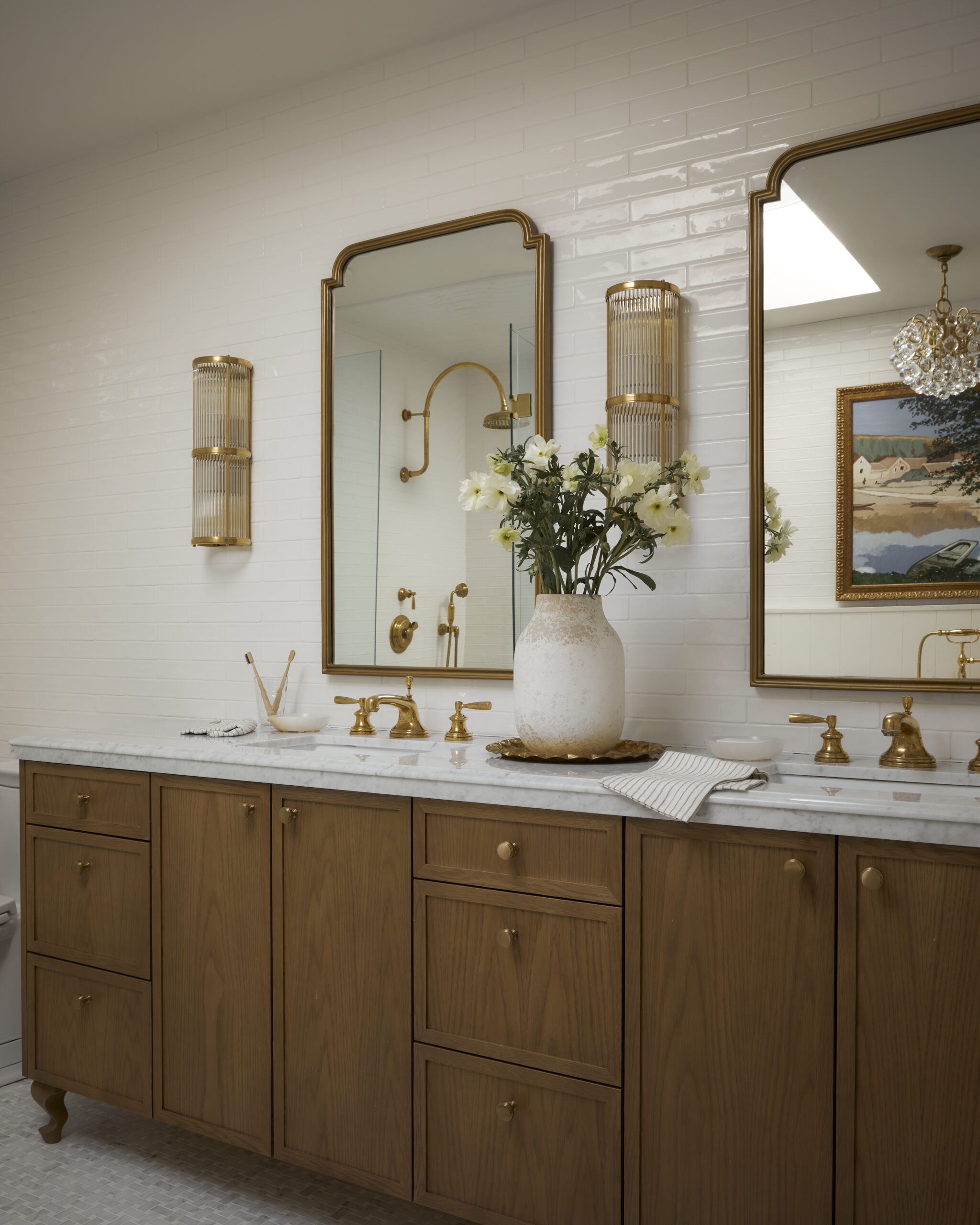 Spa-like ensuite in Toronto home renovation with marble finishes and soothing palette