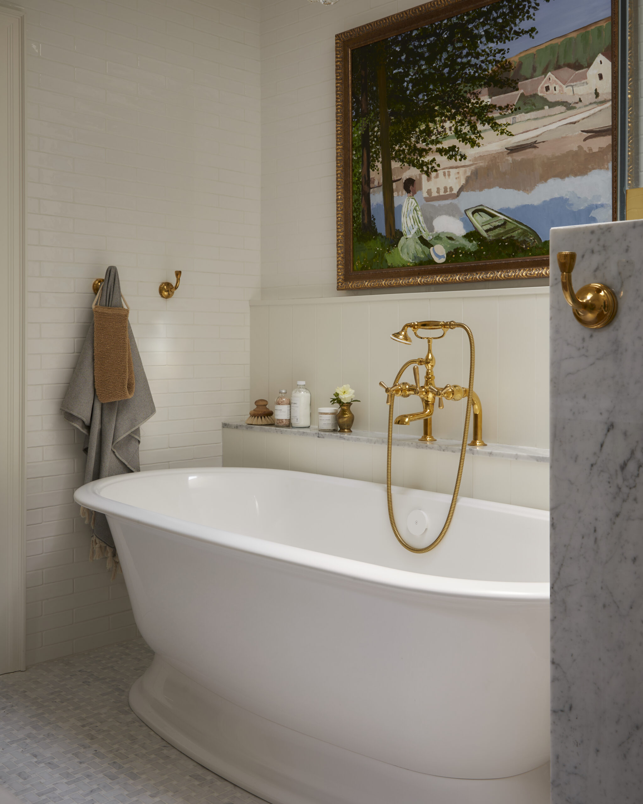Spa-like ensuite in Toronto home renovation with marble finishes and soothing palette
