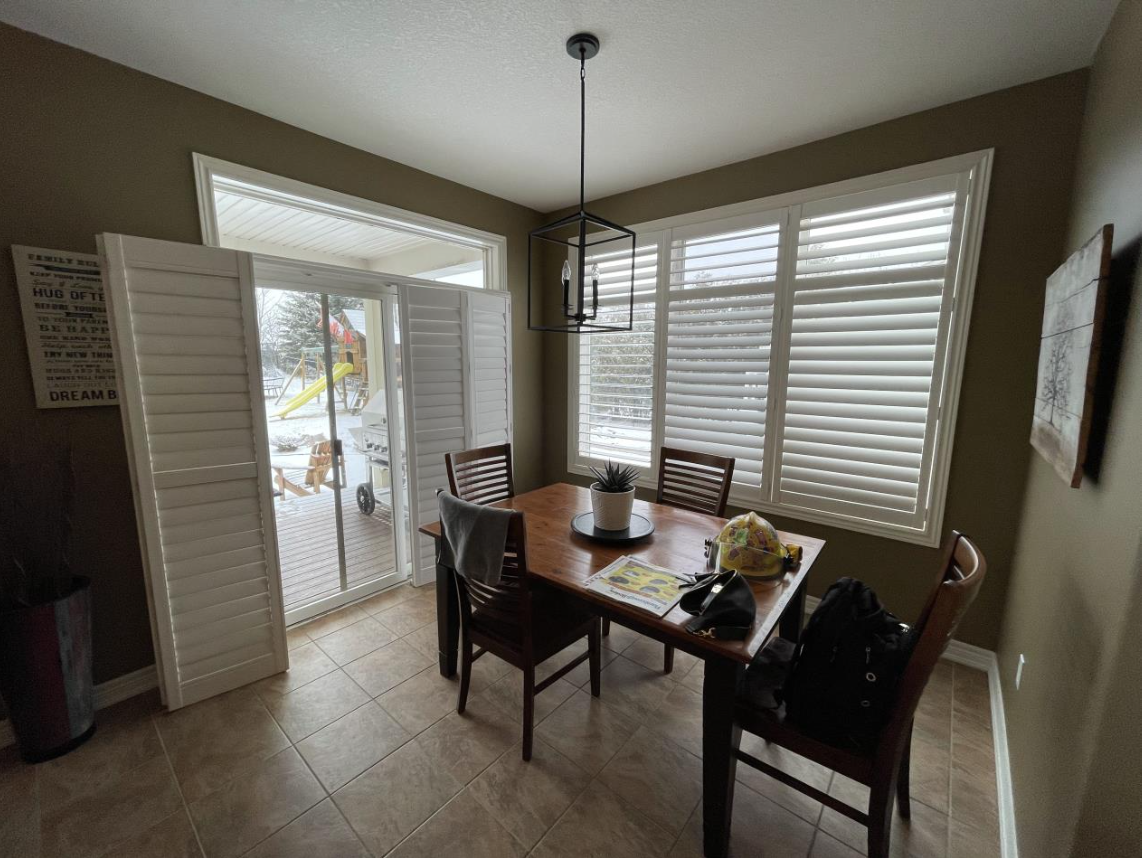 Before photo of the older kitchen eating ares prior to renovation